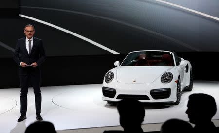 Dr. Oliver Blume, Chairman of the Executive Board for Porsche AG, introduces the 2017 Porsche 911 Turbo S at the North American International Auto Show in Detroit, Michigan January 11, 2016. REUTERS/Rebecca Cook