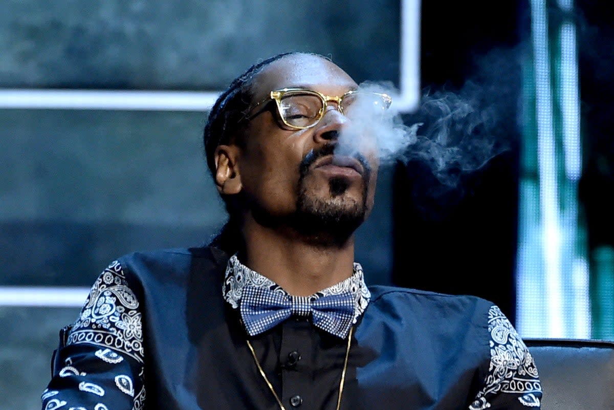 Rapper Snoop Dogg has created a personal brand that’s synonymous with getting high (Getty)