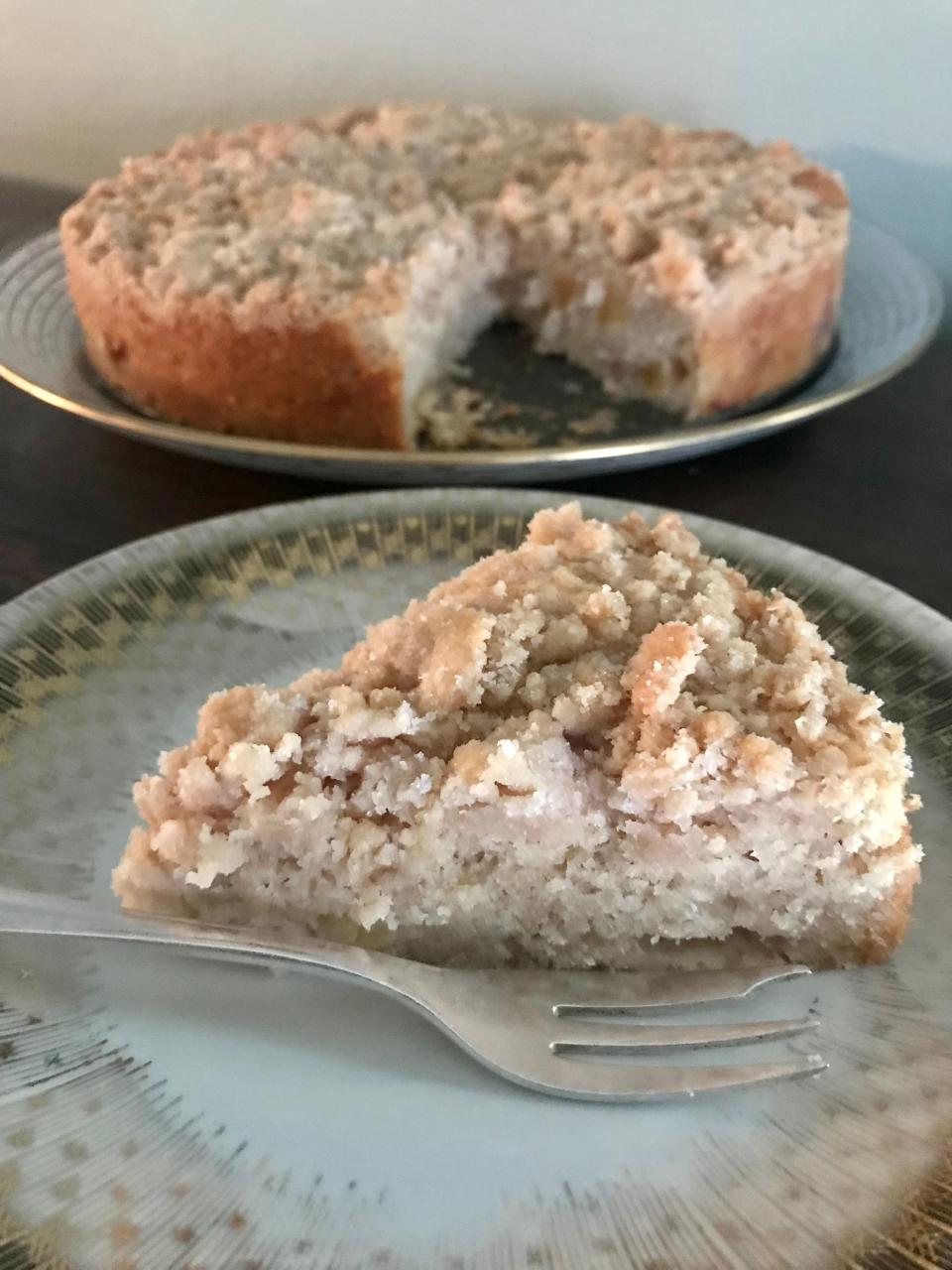 Apple sour cream crumb cake from "The Sweeter Side of Sourdough" has discard starter in the crumb topping and active starter in the batter. Apples keep the cake moist.