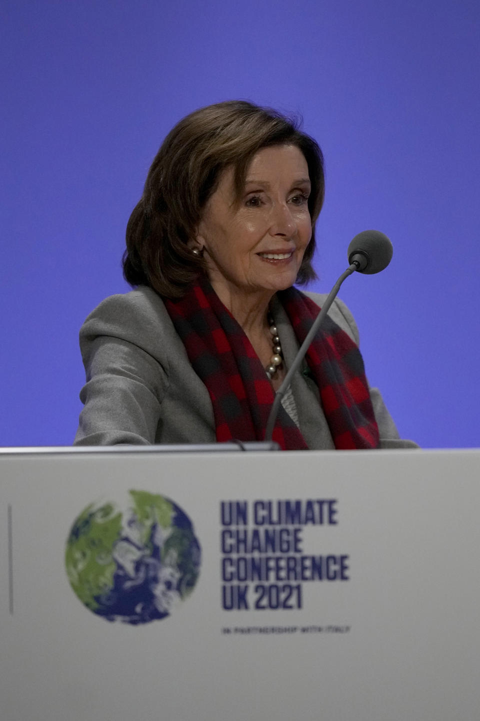 Speaker of the United States House of Representatives Nancy Pelosi smiles during an event, at the COP26 U.N. Climate Summit, in Glasgow, Scotland, Wednesday, Nov. 10, 2021. The U.N. climate summit in Glasgow has entered its second week as leaders from around the world, are gathering in Scotland's biggest city, to lay out their vision for addressing the common challenge of global warming. (AP Photo/Alastair Grant)