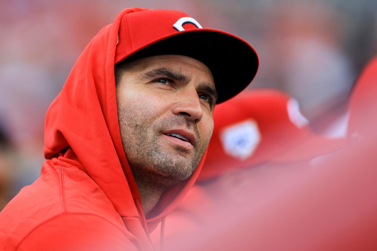 Cincinnati Reds' Joey Votto sits in the dugout during a baseball game against the Philadelphia Phillies in Cincinnati, Saturday, April 15, 2023. The Reds won 13-0. (AP Photo/Aaron Doster)