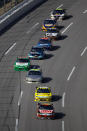 TALLADEGA, AL - OCTOBER 23: Greg Biffle, driver of the #16 3M/O'Reilly Auto Parts Ford, leads a line of cars during the NASCAR Sprint Cup Series Good Sam Club 500 at Talladega Superspeedway on October 23, 2011 in Talladega, Alabama. (Photo by Chris Graythen/Getty Images)