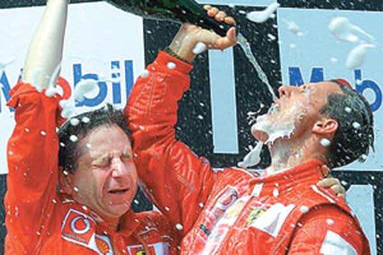 Jean Todt y Michael Schumacher, embriagados por tanto éxito