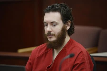 James Holmes sits in court for an advisement hearing at the Arapahoe County Justice Center in Centennial, Colorado June 4, 2013. Holmes, who could face execution if convicted of killing 12 moviegoers last summer, entered a plea of not guilty by reason of insanity on Tuesday, and the judge accepted his plea. REUTERS/Andy Cross/Pool (UNITED STATES - Tags: CRIME LAW) - RTX10BQZ