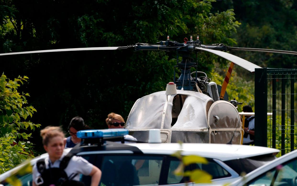 The men booked the helicopter they hijacked under their real names - GEOFFROY VAN DER HASSELT /AFP