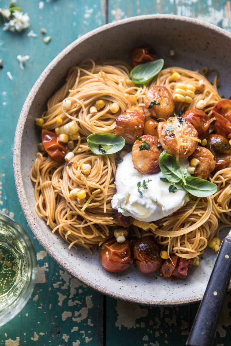 <strong>Get the <a href="https://www.halfbakedharvest.com/browned-butter-scallop-burst-tomato-basil-pasta/" target="_blank">Browned Butter Scallop and Burst Tomato Basil Pasta recipe</a>&nbsp;from Half Baked Harvest</strong>