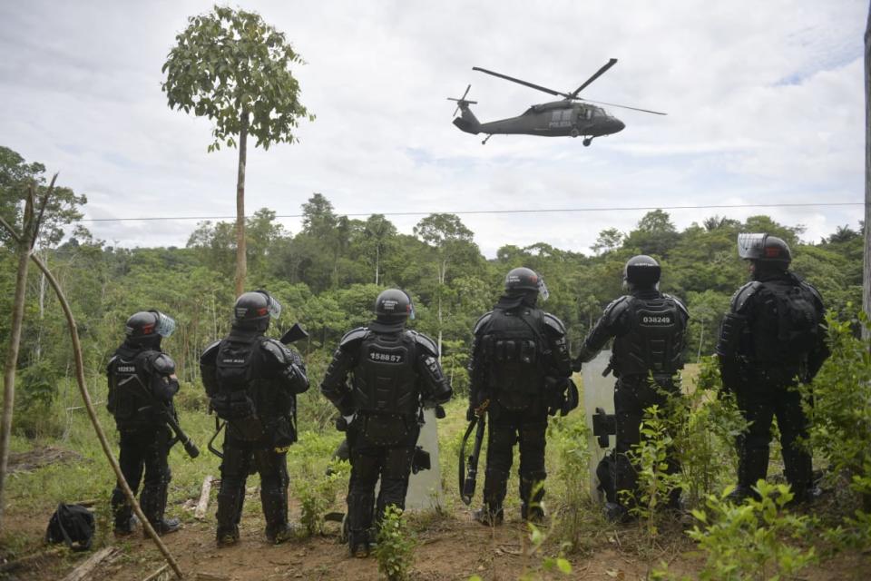 <div class="inline-image__caption"><p>Colombian police take over a coca field on Feb. 26, 2020.</p></div> <div class="inline-image__credit">RAUL ARBOLEDA/AFP via Getty Images</div>