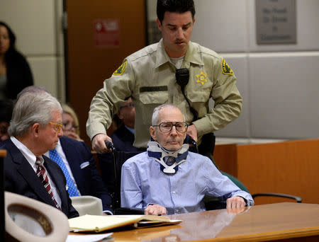 Robert Durst in a wheelchair arrives for his arraignment on capital murder charges in the death of Susan Berman, with his lawyer Dick DeGuerin (L) looking on, in Los Angeles, California, U.S. November 7, 2016. REUTERS/Kevork Djansezian