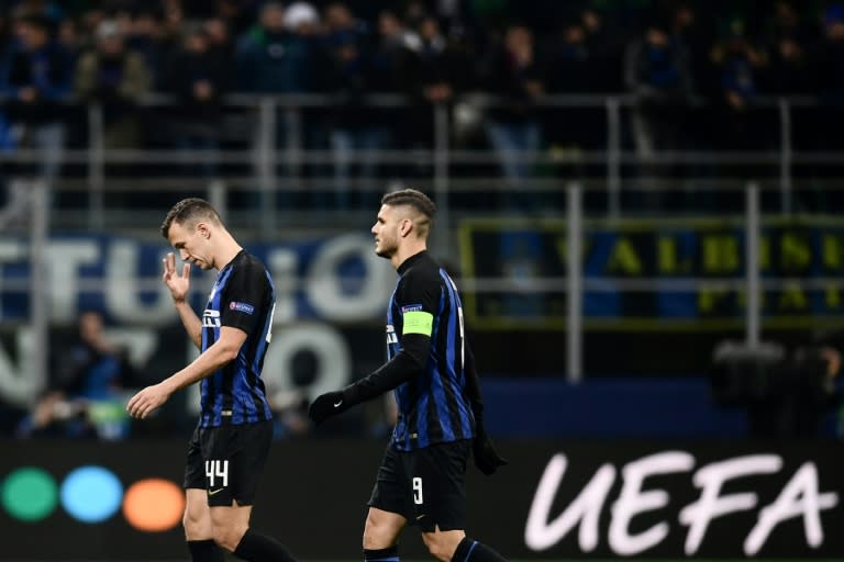 Inter Milan's Ivan Perisic and Mauro Icardi (right) are downcast at the final whistle