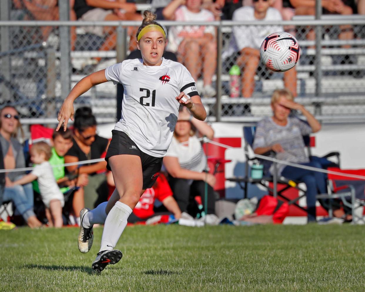 Clinton's Madalyn Freitas chases down a ball during the Division 3 MHSAA girls soccer district final at Milan.