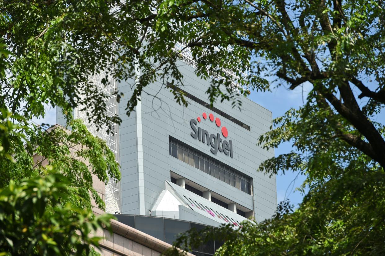 Singtel logo is seen on its headquarter building in Singapore on May 12, 2016. Singapore Telecom (Singtel) on May 12 reported a full-year net profit rise, driven by increased mobile data usage as more customers browse the Internet on handheld devices. / AFP / ROSLAN RAHMAN        (Photo credit should read ROSLAN RAHMAN/AFP via Getty Images)