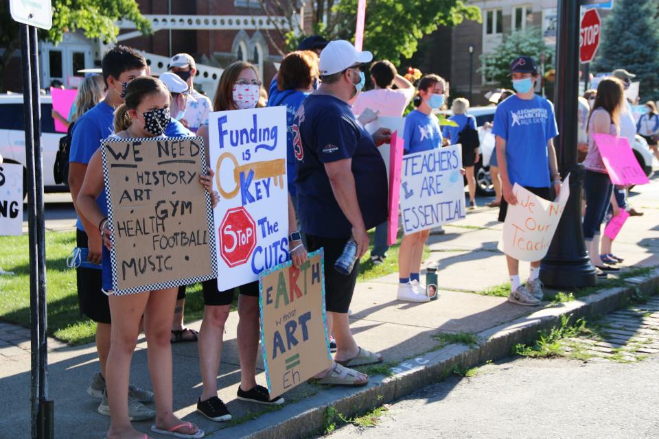 Winchendon wasn't the only Massachusetts school district faced with making controversial budget cuts. In June, dozens of people gathered on the common and around Leominster city hall to rally in support of that school system and the more than 100 staff members who had received unemployment notices.