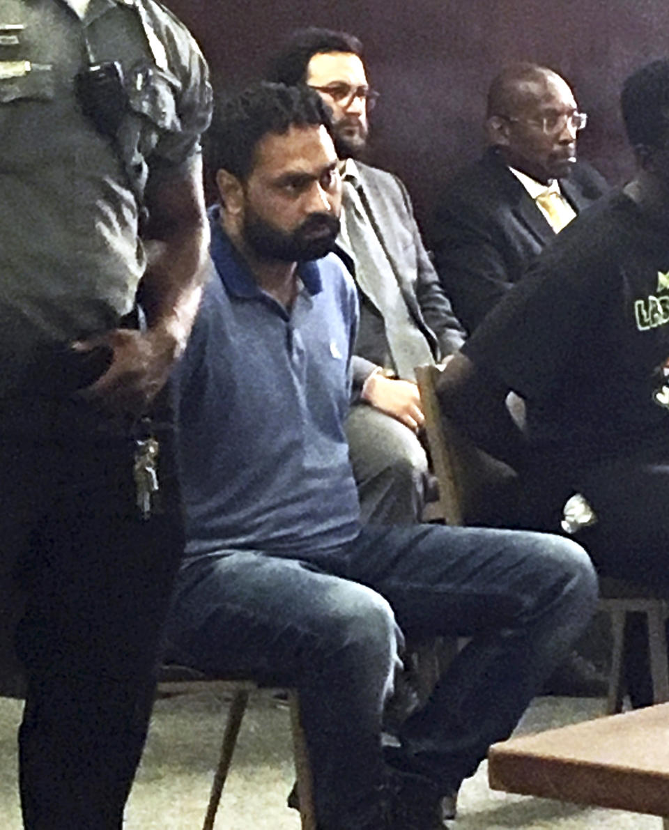 FILE - In this July 2, 2019 file photo Gurpreet Singh sits during arraignment in Superior Court in New Haven, Conn., in connection to the deaths of four people in West Chester, Ohio in April. Singh waived extradition to Ohio and did not enter a plea. (Mark Zaretsky/New Haven Register via AP, Pool, File)