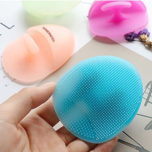 14) Silicone Face Cleanser And Massager Brush