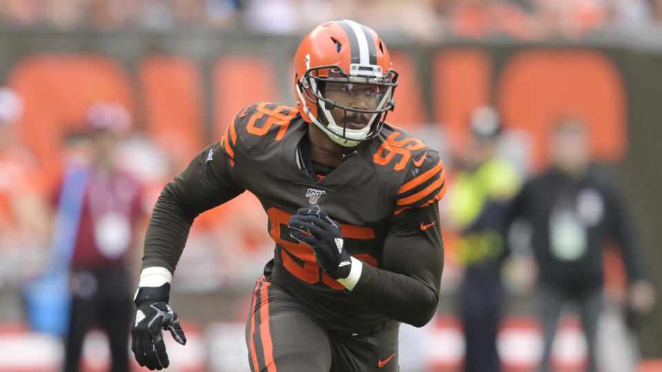 FILE- In this Sunday, Sept. 8, 2019, file photo, Cleveland Browns defensive end Myles Garrett (95) rushes the passer in the first half of an NFL football game against the Tennessee Titans in Cleveland. Garrett has six sacks this season, (AP Photo/David Richard)