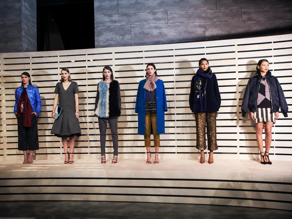 Row of models wearing J. Crew stand on stage at New York Fashion Week