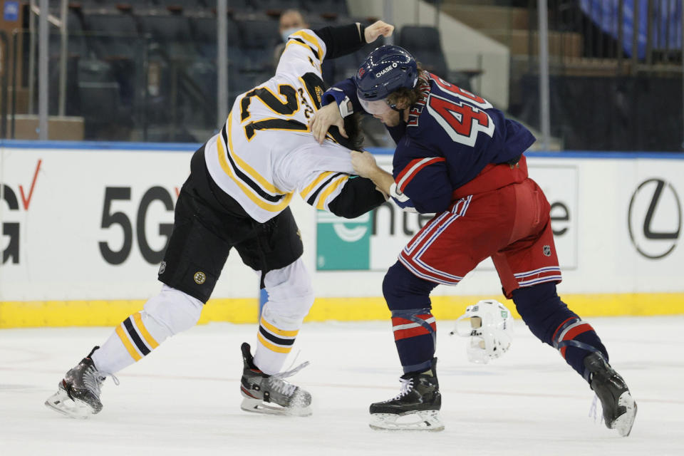 Brendan Lemieux, right, of the New York Rangers, fights Nick Ritchie, left, of the Boston Bruins during the third period of an NHL game at Madison Square Garden Sunday, Feb. 28, 2021, in New York. (Sarah Stier/Pool Photo via AP)