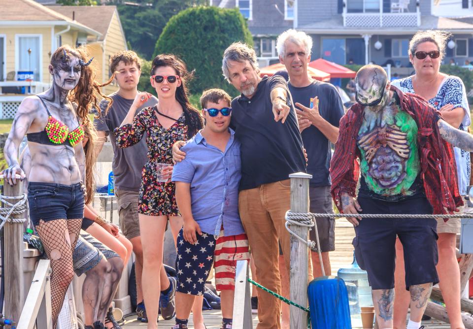 A shot from the documentary "Sam & Mattie Make a Zombie Movie" shows, from left, Alison Maier, Torby Frazier, Madline Brumby, Mattie Zufelt, Peter Farrelly, Chris Suchmann, Peter Fonte and Mary Pendergast.