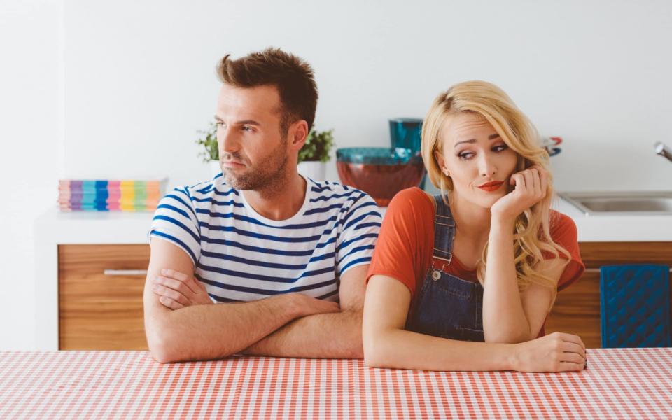 Unhappy couple arguing - Getty Images Contributor / izusek