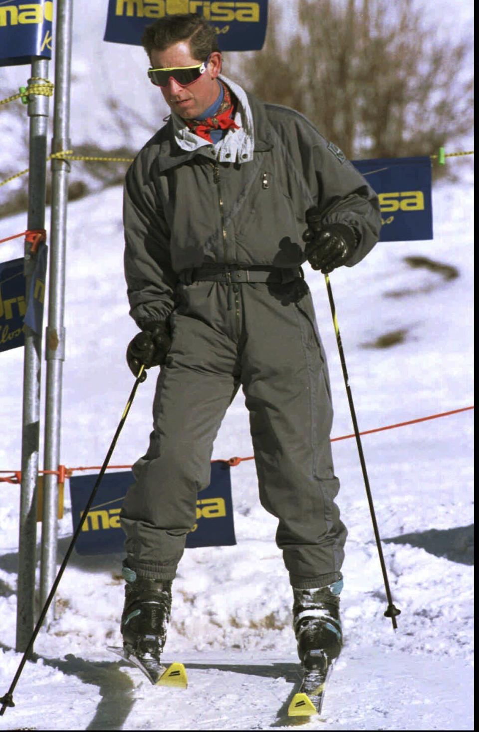 FILE - Britain's Prince Charles enters a skilift on the slopes above the alpine skiing resort of Klosters in Switzerland, Jan. 2, 1996. The announcement on Monday Feb. 5, 2024 that King Charles III has been diagnosed with cancer has come as a shock to many in Britain, largely because the 75-year-old monarch has generally enjoyed good health through the years. (AP Photo/Arno Blazarini, File)