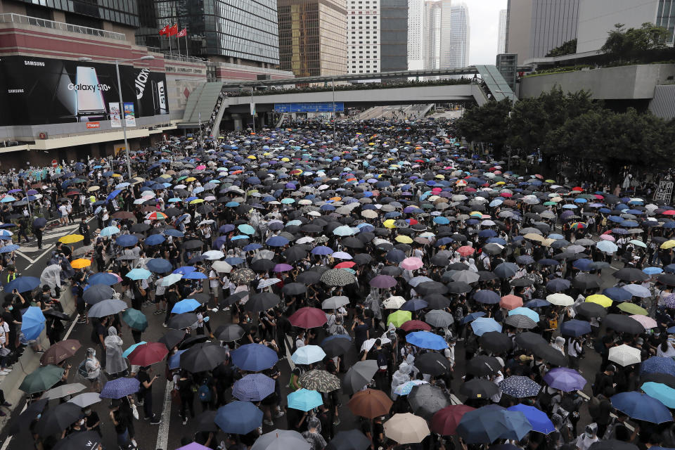 FILE - In this file photo taken Wednesday, June 12, 2019, protestors gather near the Legislative Council in Hong Kong. Hong Kong's leader Carrie Lam is pushing forward amendments to extradition laws which would allow people to be sent to mainland China to face charges. The proposed legislation has triggered in recent days the largest protests in Hong Kong in more than a decade, as some residents fear this will be their last chance to speak out publicly without threat of arrest at mainland authorities' request. (AP Photo/Vincent Yu, File)