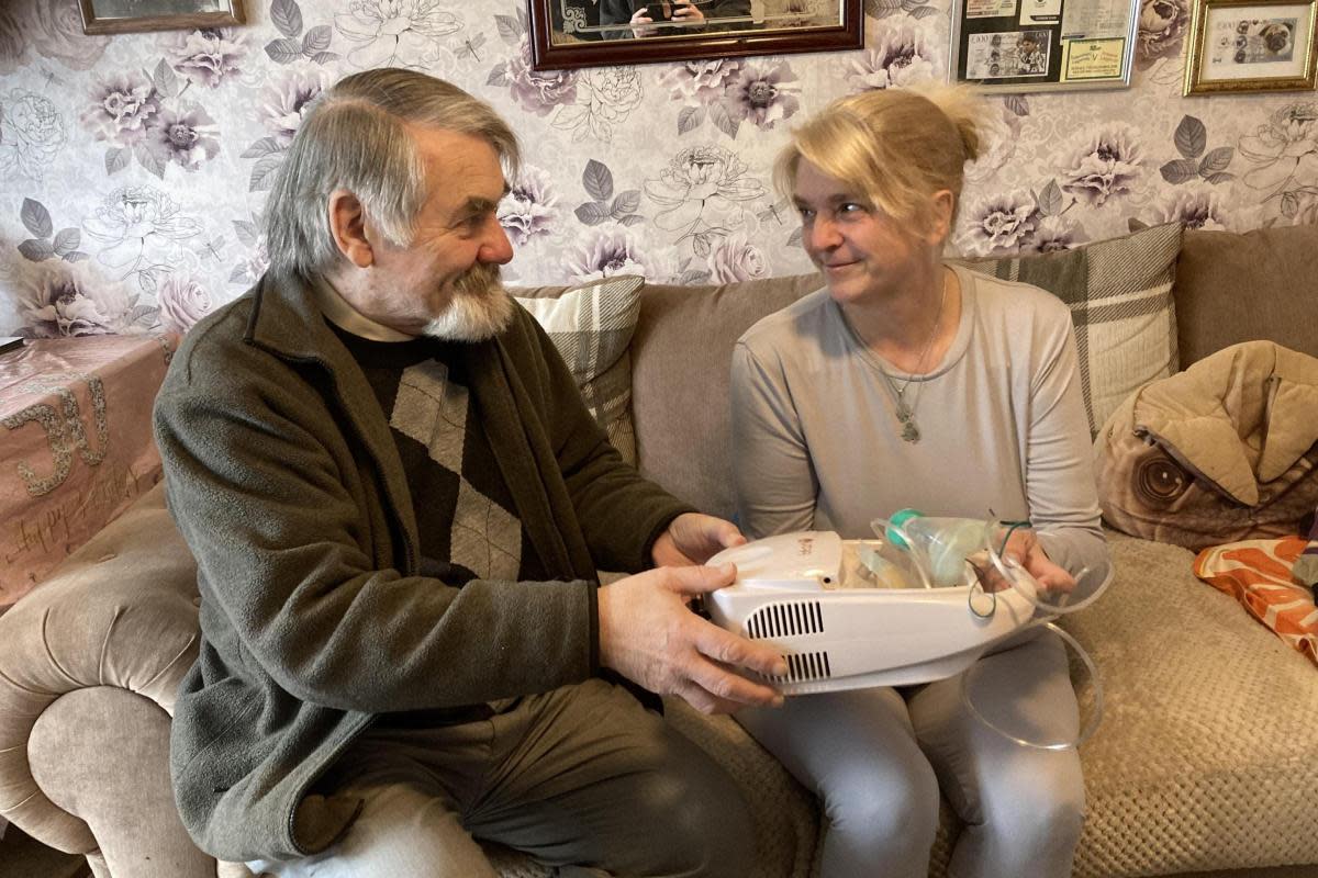 Generosity - Graham Gasson passing on the nebuliser to Amanda Richardson <i>(Image: Newsquest)</i>