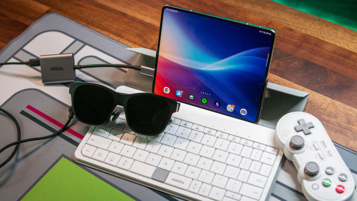  Desk setup with Xreal Air 2, Galaxy Z Fold 5, and Mokibo keyboard. 