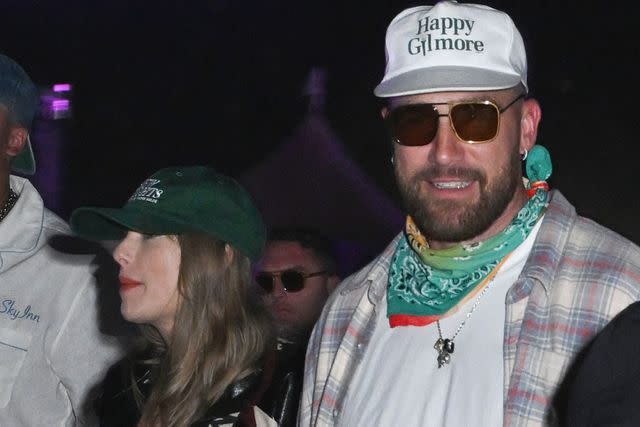 <p>Gilbert Flores/WWD via Getty</p> Taylor Swift and Travis Kelce at Neon Carnival held during the Coachella Music and Arts Festival on April 13, 2024 in Thermal, California.