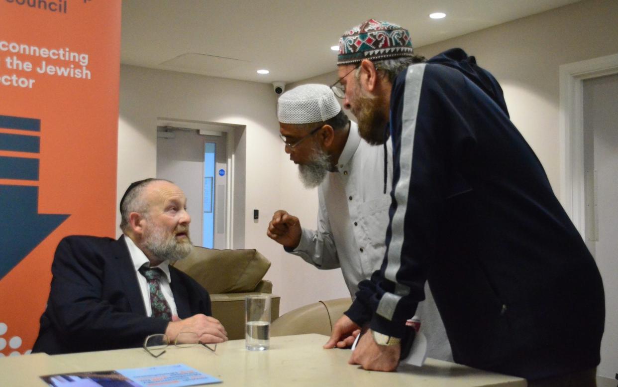 Rabbi Arnie Saunders was invited by the mosque's elders, pictured