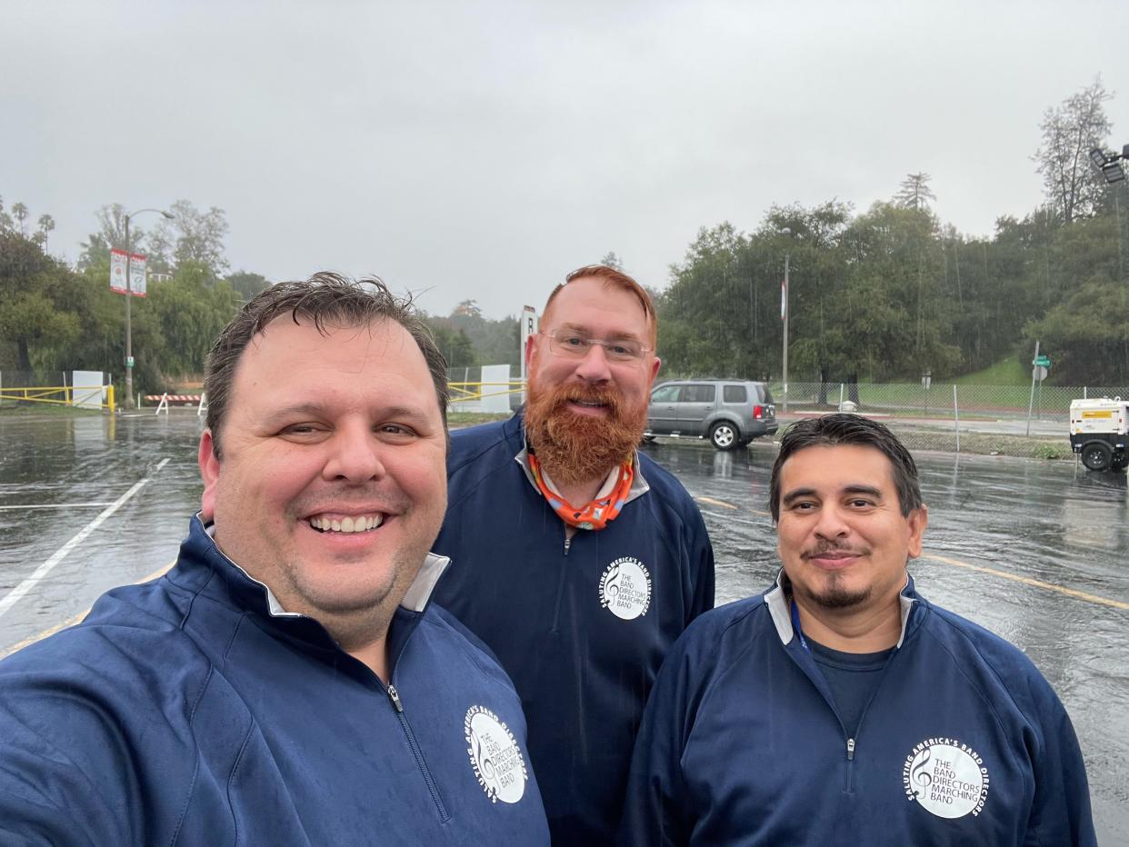 Band directors Brian McDaniel (left), Mark Wienand (middle), and Daniel Granillo (right) pose for a photo in Pasadena, Calif., Thursday, Dec. 30, 2021.