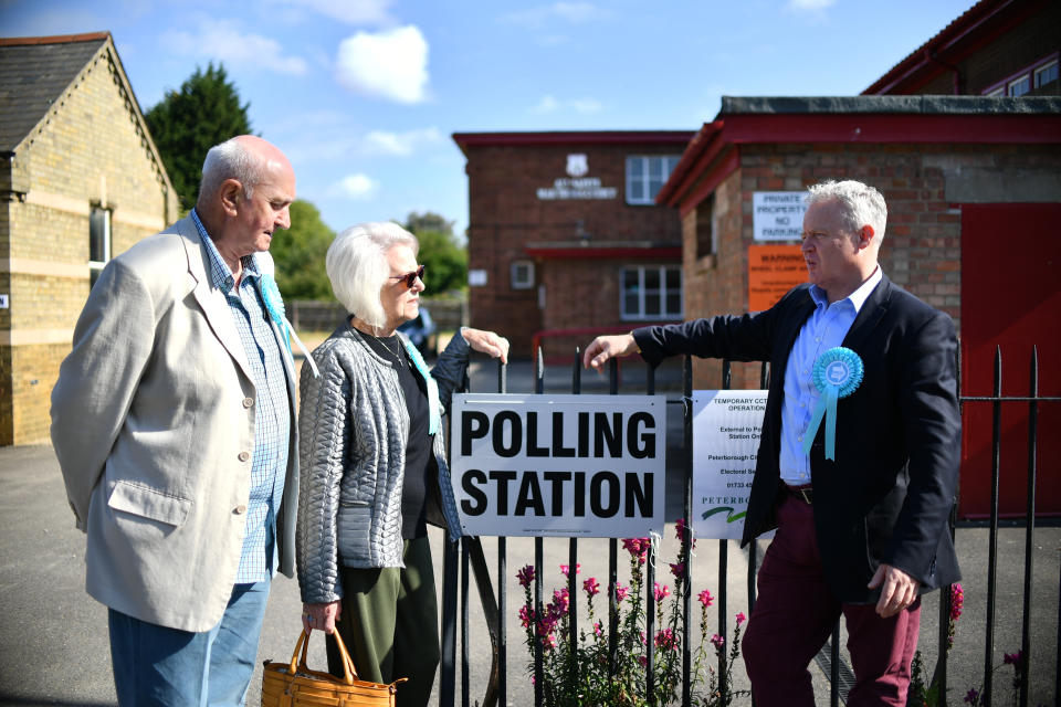The Brexit Party's Mike Greene (right) outside a polling station in Peterborough (Photo by Joe Giddens/PA Images via Getty Images)