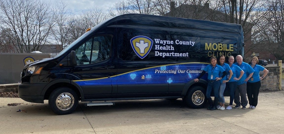 Cheryl Fields, left, Director Patty Reining, Melissa Ahrens, Mark Ritchey and Betsy Miller are on the nursing team that works on the new Wayne County Health Department Mobile Unit.