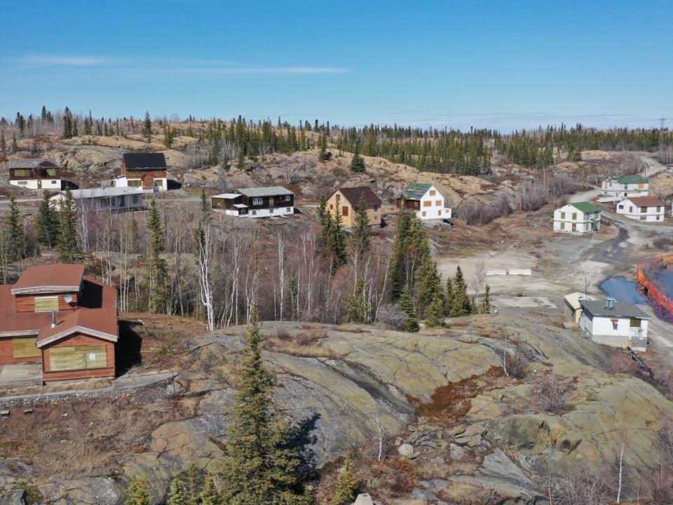 Most of the buildings on Giant Mine’s town site are being torn down this summer. It’s part of the $1 billion remediation project that is expected to be complete by 2038.   (Travis Burke/CBC News - image credit)