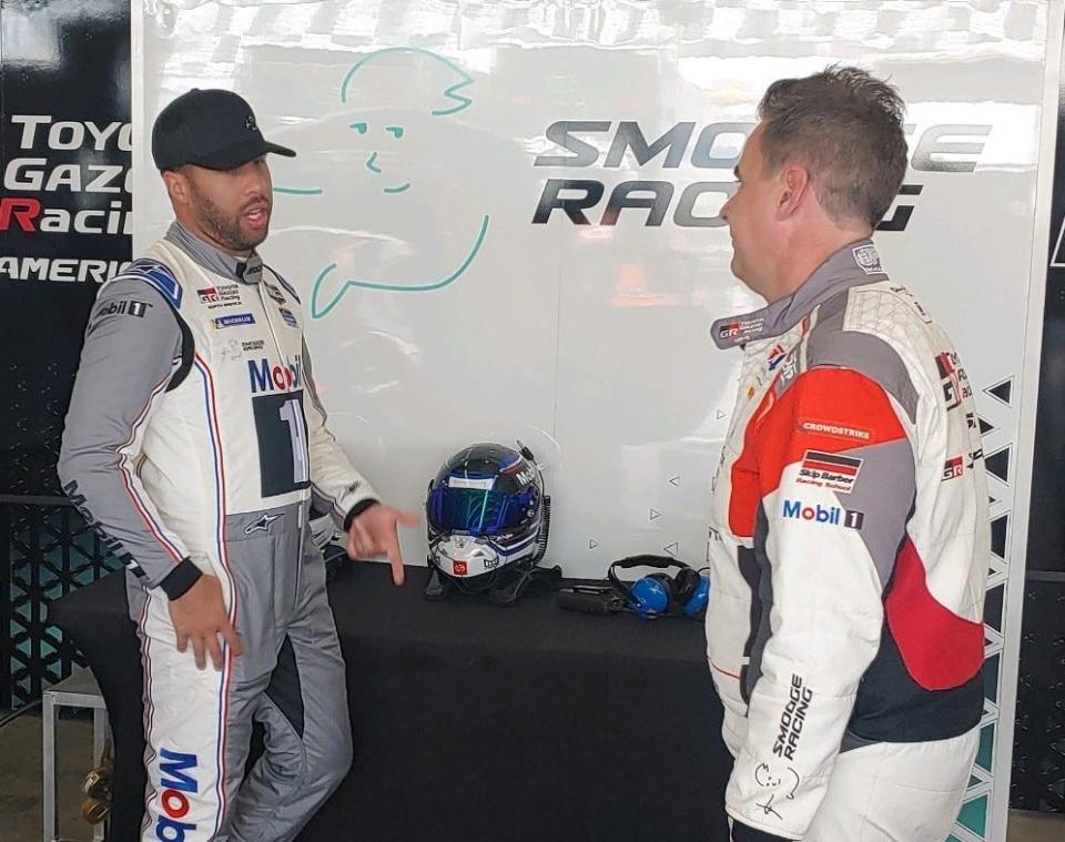 Bubba Wallace chats with fellow Toyota driver Kevin Conway during some Friday downtime at Daytona.