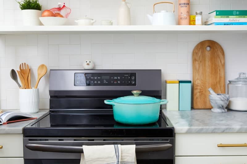 kitchen with blue pot on the stove