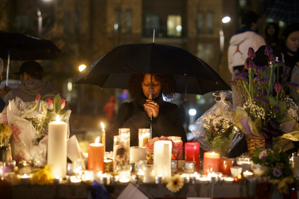 <p>Senait Teclom attends a vigil for the victims of the mass killing on April 24, 2018 in Toronto, Canada. (Photo: Cole Burston/Getty Images) </p>