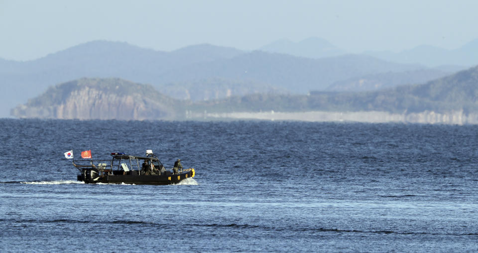 A South Korean marine boat patrols near Yeonpyeong island, South Korea, Sunday, Sept. 27, 2020. North Korea accused South Korea of sending ships across the disputed sea boundary to find the body of a man recently killed by North Korean troops, warning Sunday the alleged intrusion could escalate tensions. (Baek Seung-ryul/Yonhap via AP)