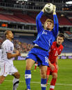 NASHVILLE, TN - MARCH 24: Goalkeeper Michal Misiewicz #18 of Canada jumps to make a save against the USA in a 2012 CONCACAF Men's Olympic Qualifying match at LP Field on March 24, 2012 in Nashville, Tennessee. (Photo by Frederick Breedon/Getty Images)