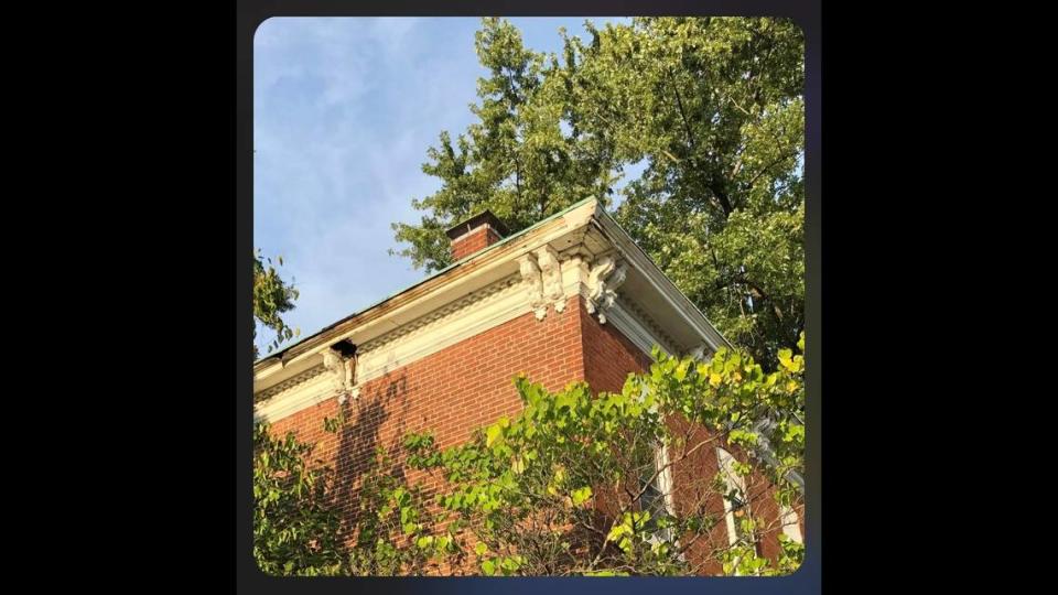 Deterioration of a historic home at 321 W. C St. in Belleville includes cracks and holes in a cornice around the top. It was built in 1878 by a coal-mine operator named John Maule.