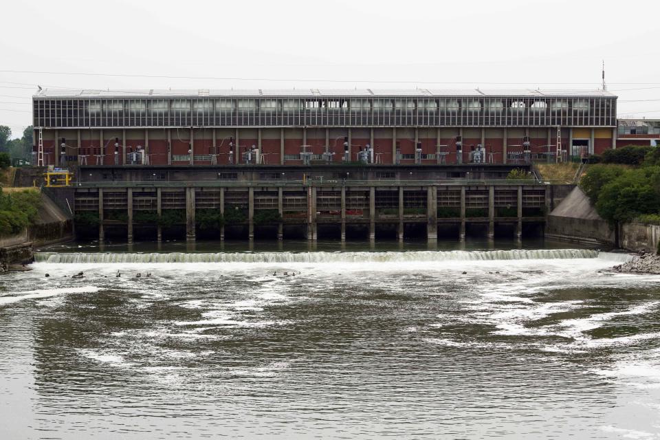 A view of the Enel green power Hydroelectric power plant at Isola Serafini, on the Po river in San Nazzaro, Italy, Wednesday, June 15, 2022. If the Po dries up due to drought, numerous hydroelectric power plants will be brought to a halt, at a time where the war in Ukraine has already hiked up energy prices across Europe. (AP Photo/Luca Bruno)