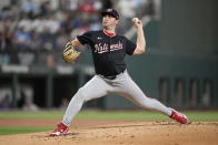 Washington Nationals starting pitcher Mitchell Parker throws to the Texas Rangers in the first inning of a baseball game in Arlington, Texas, Thursday, May 2, 2024. (AP Photo/Tony Gutierrez)
