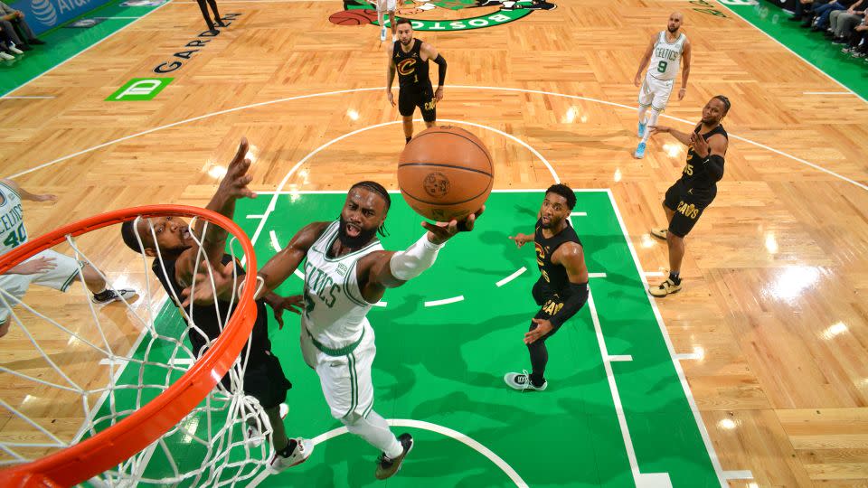 Brown drives to the basket against Evan Mobley. - Jesse D. Garrabrant/NBAE/Getty Images