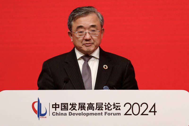 FILE PHOTO: China's special envoy for climate change Liu Zhenmin speaks at the China Development Forum (CDF) 2024, in Beijing