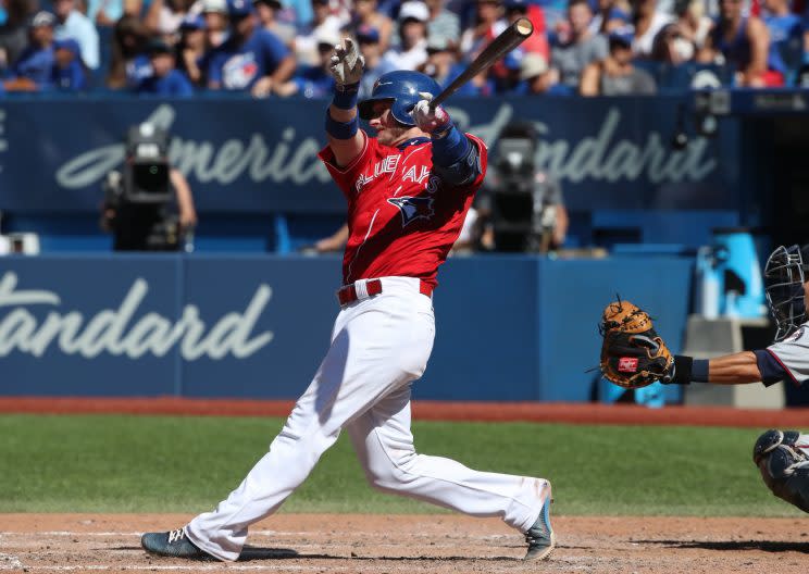 Josh Donaldson admired a lot of baseballs Sunday. (Getty Images/Tom Szczerbowski)