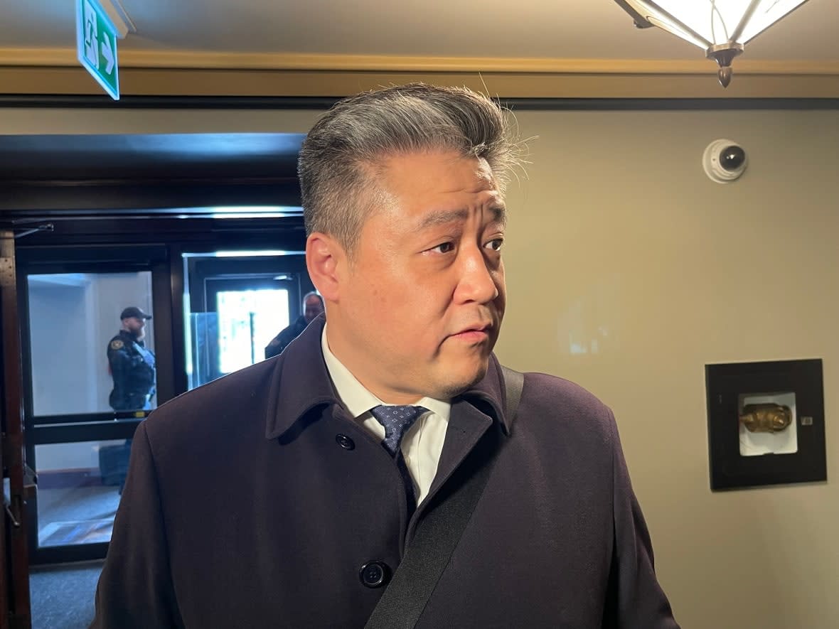 Liberal MP Han Dong speaks with reporters outside the House of Commons on March 21, 2023. Johnston said in his report that media allegations that Dong advised Chinese diplomats to delay releasing Michael Kovrig and Michael Spavor are false. (Chris Rands/CBC - image credit)