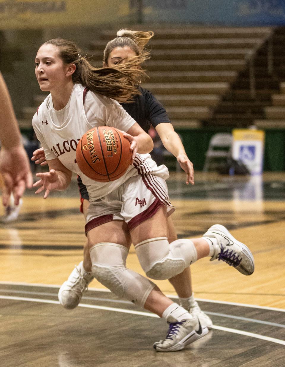 Albertus Magnus' Maddy Zuppe drives toward the basket against Hilton during the state Class AA girls basketball final on March 16, 2024.