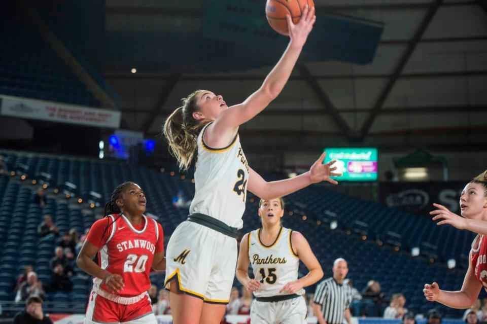 Mead guard Teryn Gardner (24) puts up a shot in the fourth quarter against Stanwood in the quarterfinals of the Class 3A girls state basketball tournament on Thursday, March 2, 2023 at the Tacoma Dome in Tacoma, Wash.