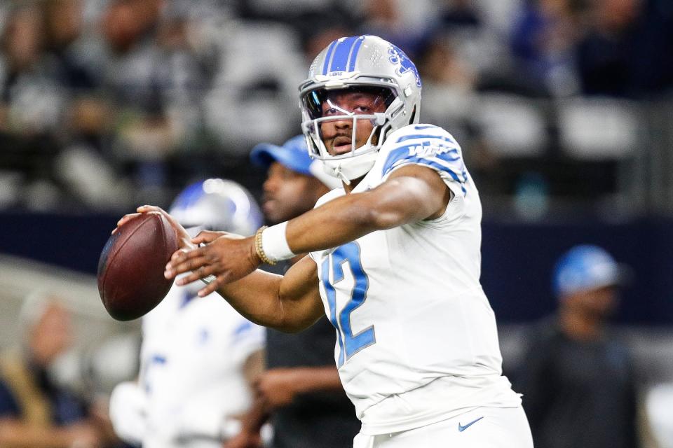 Detroit Lions quarterback Hendon Hooker warms up before the Dallas Cowboys game at AT&T Stadium in Arlington, Texas on Saturday, Dec. 30, 2023.