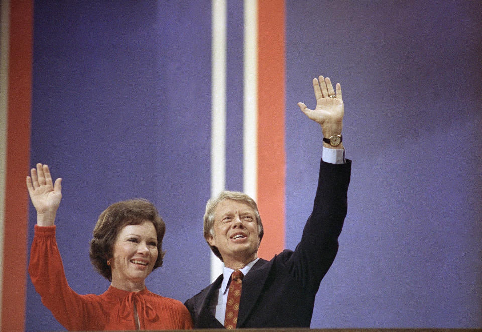 FILE - In this July 15, 1976, file photo Jimmy Carter and wife Rosalynn wave at the National Convention in Madison Square Garden in New York. Jimmy and Rosalynn are celebrating their 77th wedding anniversary, Friday, July 7, 2023. (AP Photo, File)