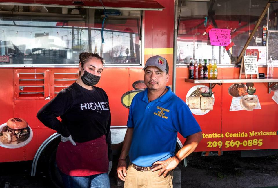 Antonio Hernandez, owner of Tacos El Tony, right, with his employee Jayleen Casillas, left, in Modesto, Calif., on Thursday, Jan. 27, 2022.